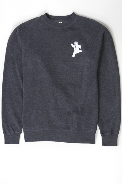 A grey fleece sweatshirt with the Yum Yum Shop running gingerbread man printed in the upper corner.